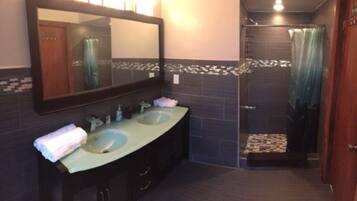 Shower, jetted bath, hair dryer, towels