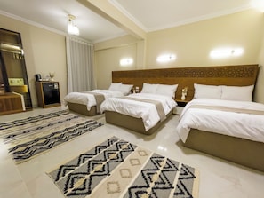 Family Triple Room, Balcony, Mountain View | Minibar, free WiFi, bed sheets
