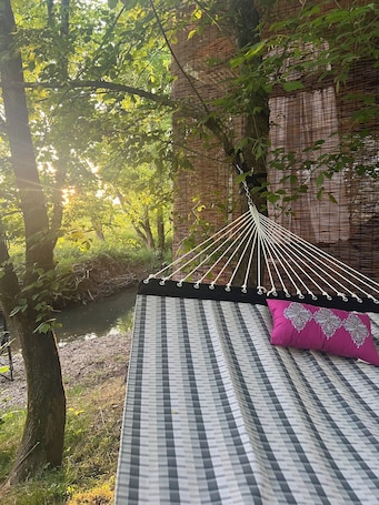 Property grounds. Off-grid creekside treehouse w/fire-pit, hammock