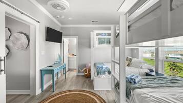 4 bedrooms, desk, iron/ironing board, travel cot