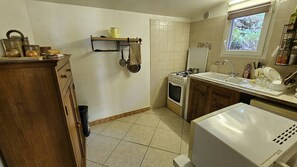 Fridge, microwave, cookware/dishes/utensils