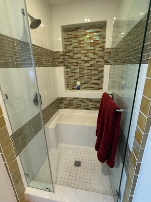 Shower, hair dryer, towels, soap