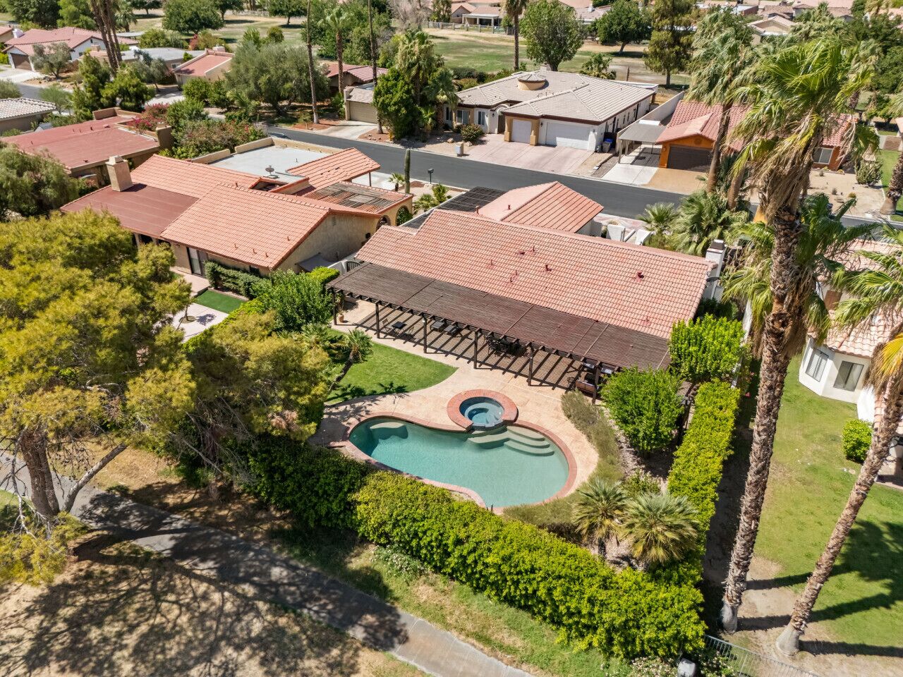 Casa Palmera, Palm-Lined Spanish Oasis w/ Pool, Spa, BBQ & Games near Coachella, Indio CA by Rather Be Properties