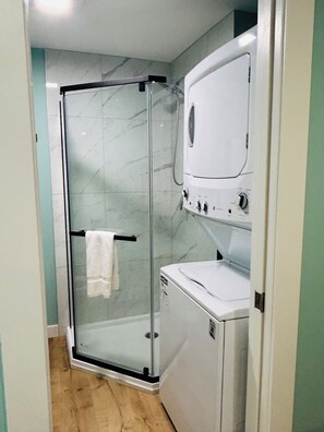 Shower, towels, soap, shampoo