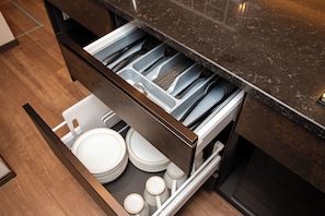 Mini-fridge, microwave, stovetop, cookware/dishes/utensils