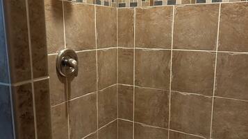 Jetted tub, hair dryer, towels, soap