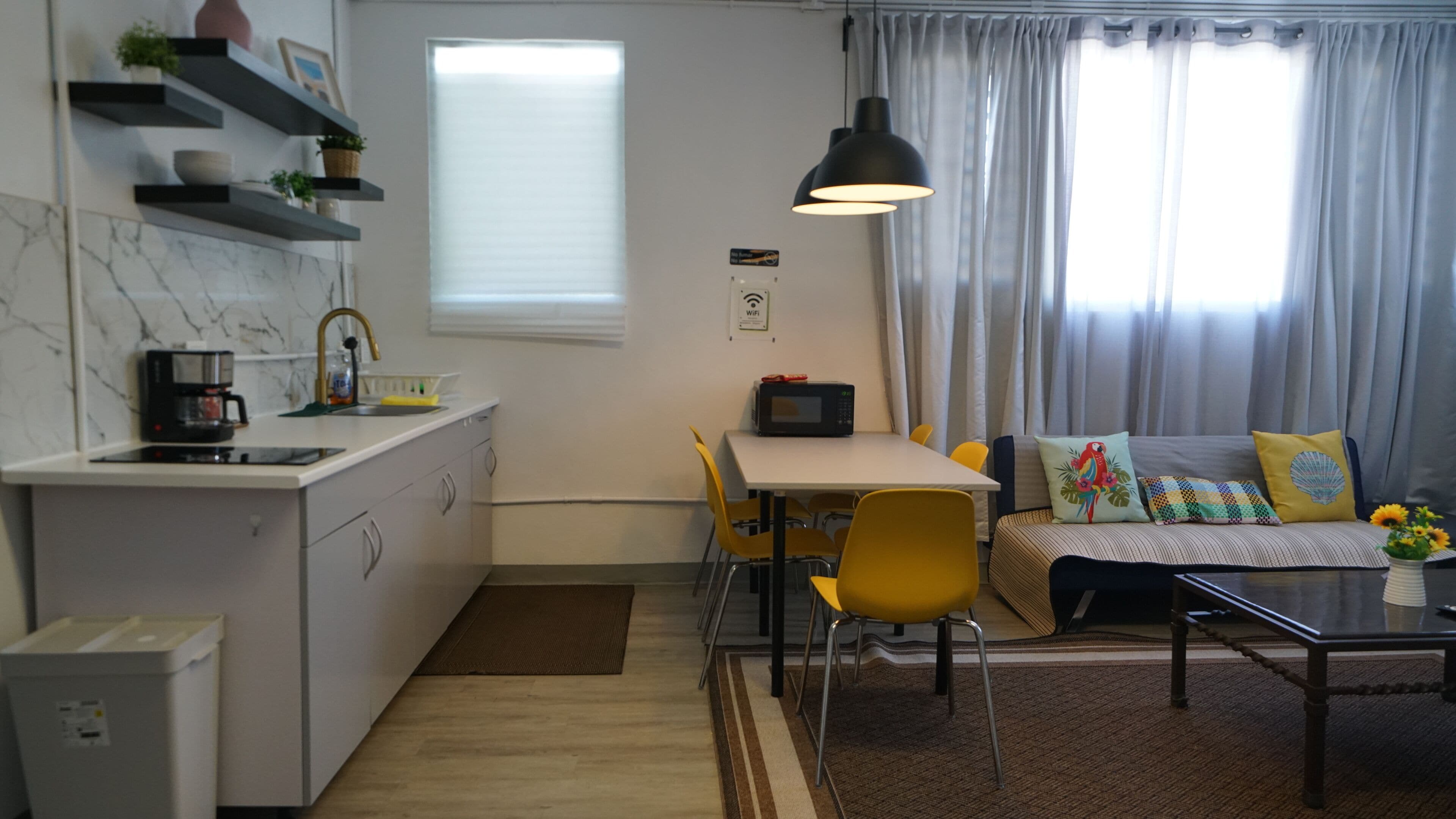 Comfort Apartment | Living area | 58-inch TV with digital channels, Netflix, Hulu