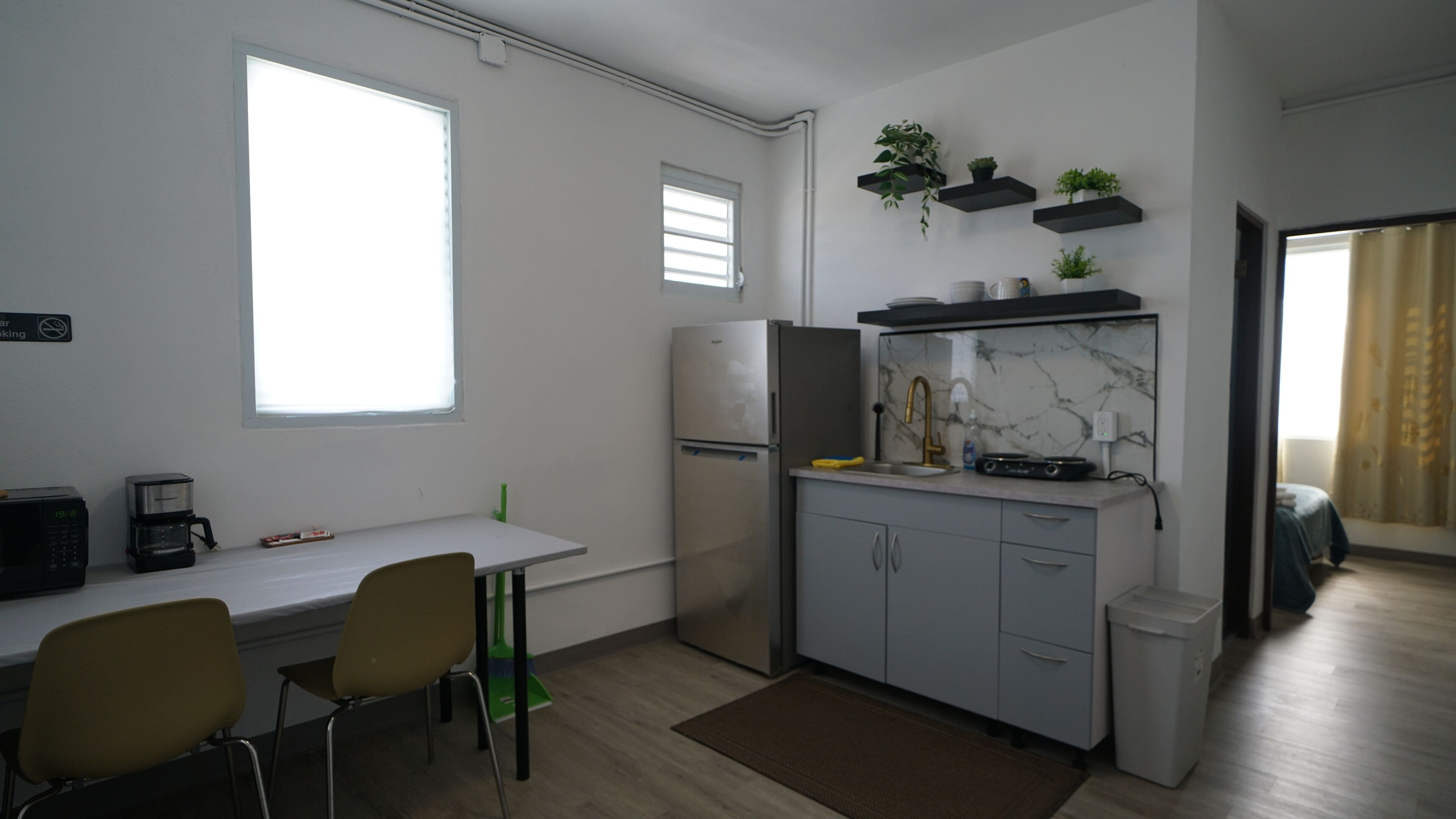 Comfort Suite | Living area | 58-inch TV with digital channels, Netflix, Hulu