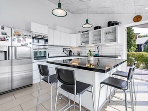 Fridge, microwave, dishwasher, cookware/dishes/utensils