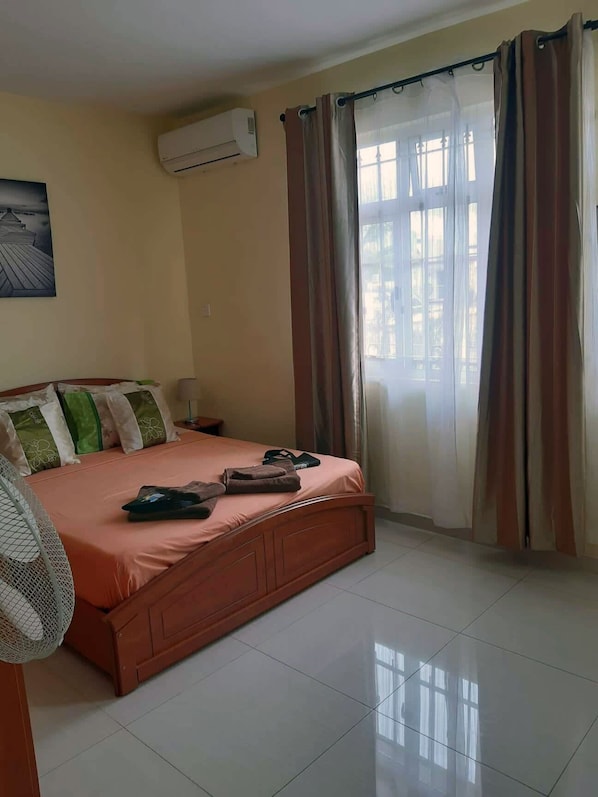 Apartment, Balcony, Courtyard View | In-room safe, iron/ironing board, free WiFi