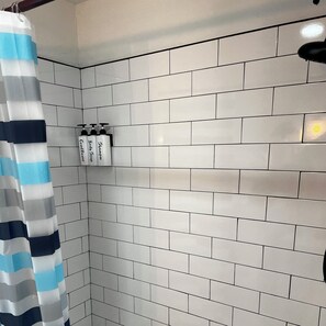 Hair dryer, towels, soap, shampoo