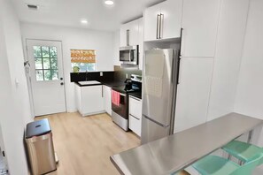 Dishwasher, coffee/tea maker, cookware/dishes/utensils