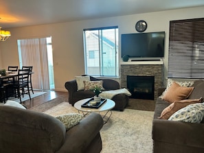 Smart TV, fireplace, books