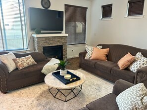 Smart TV, fireplace, books