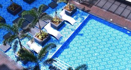 Charming 2-bedroom apartment with WiFi, AC in nice Paranaque City GENTRY