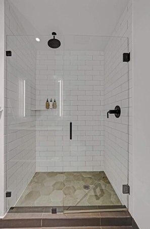 Shower, hair dryer, towels, toilet paper