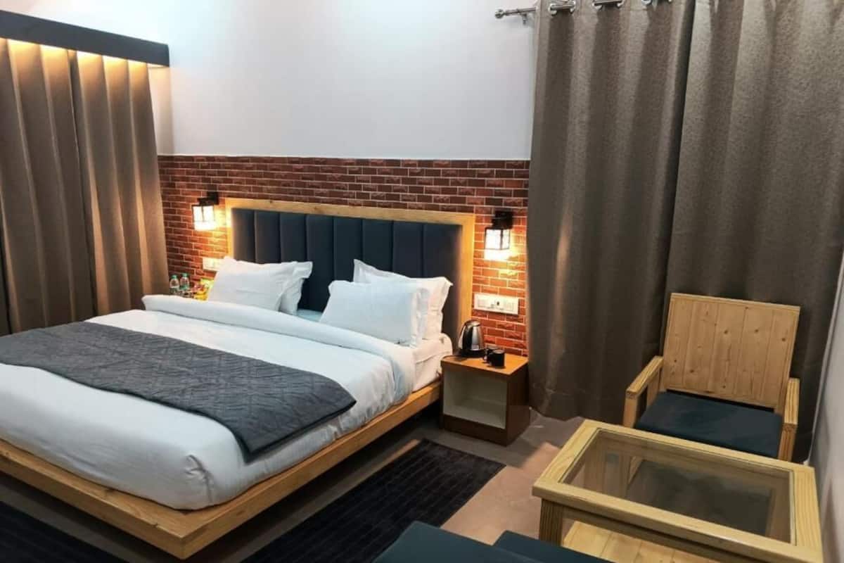 Habitación familiar, vista al jardín | Wifi gratis y ropa de cama