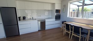 Microwave, oven, stovetop, dishwasher - Shotover Country Residence - 2 bedroom home in quiet residential area (Queenstown)