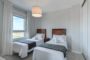 Apartamento | 3 dormitorios y tabla de planchar con plancha