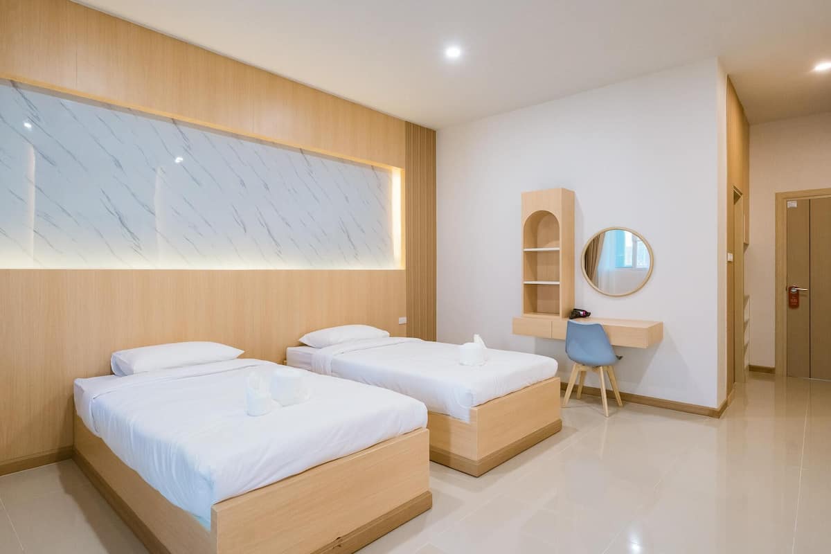 Deluxe Twin kamer | Een bureau, gratis wifi, beddengoed