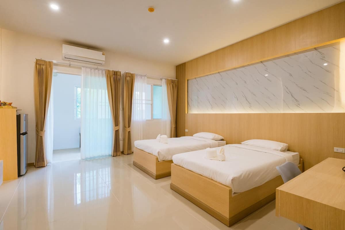 Deluxe Twin kamer, balkon | Een bureau, gratis wifi, beddengoed
