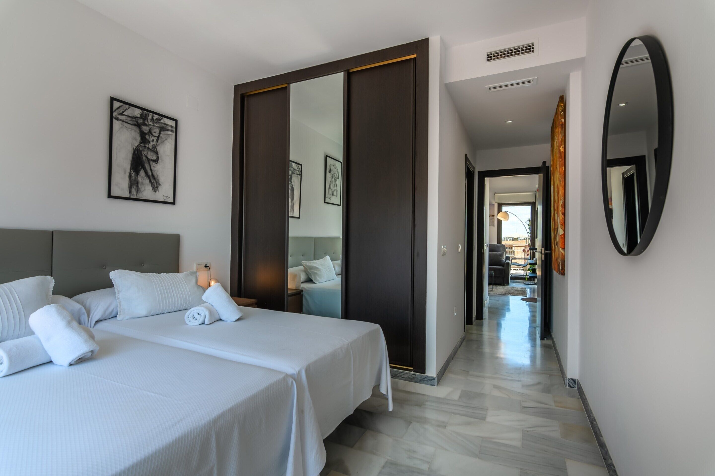 Apartamento | 3 dormitorios y tabla de planchar con plancha