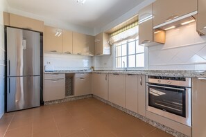 Apartment | Private kitchen | Fridge, microwave, oven, dishwasher - Family Apartment With Amenities (Ayamonte)