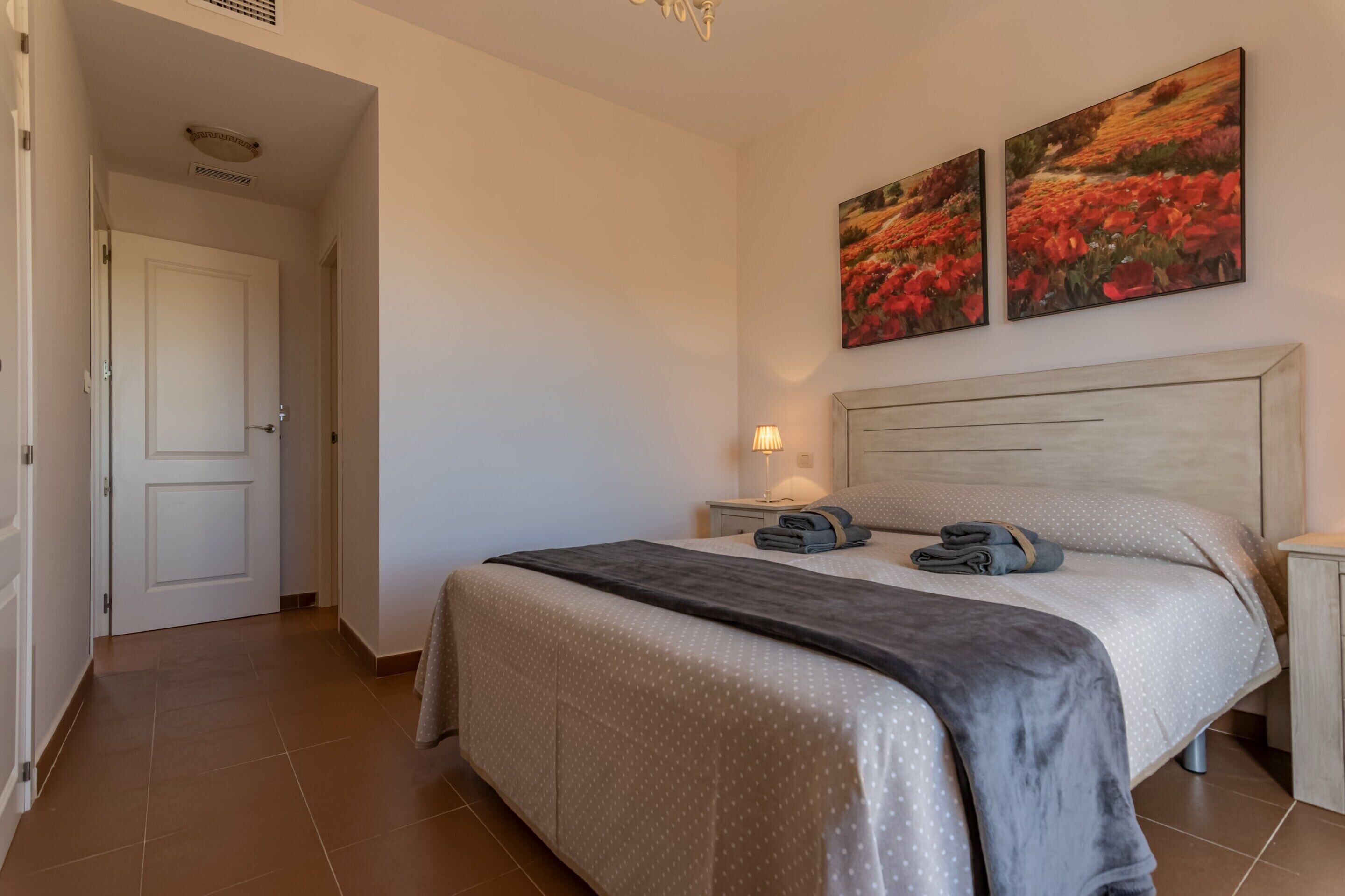 Apartamento | 3 dormitorios y tabla de planchar con plancha