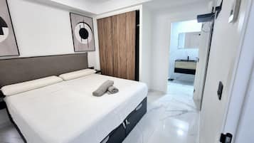 Departamento | 3 habitaciones y tabla de planchar con plancha