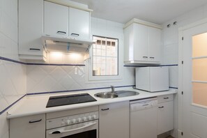 Apartment | Private kitchen - Seaside Stay in Punta del Moral (Ayamonte)