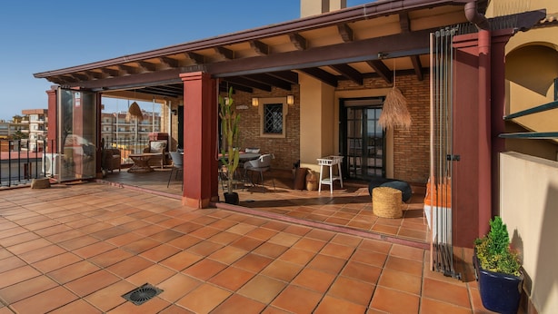 Apartamento | Restaurante al aire libre