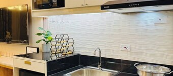 伊洛伊洛市時尚公寓房，共享泳池