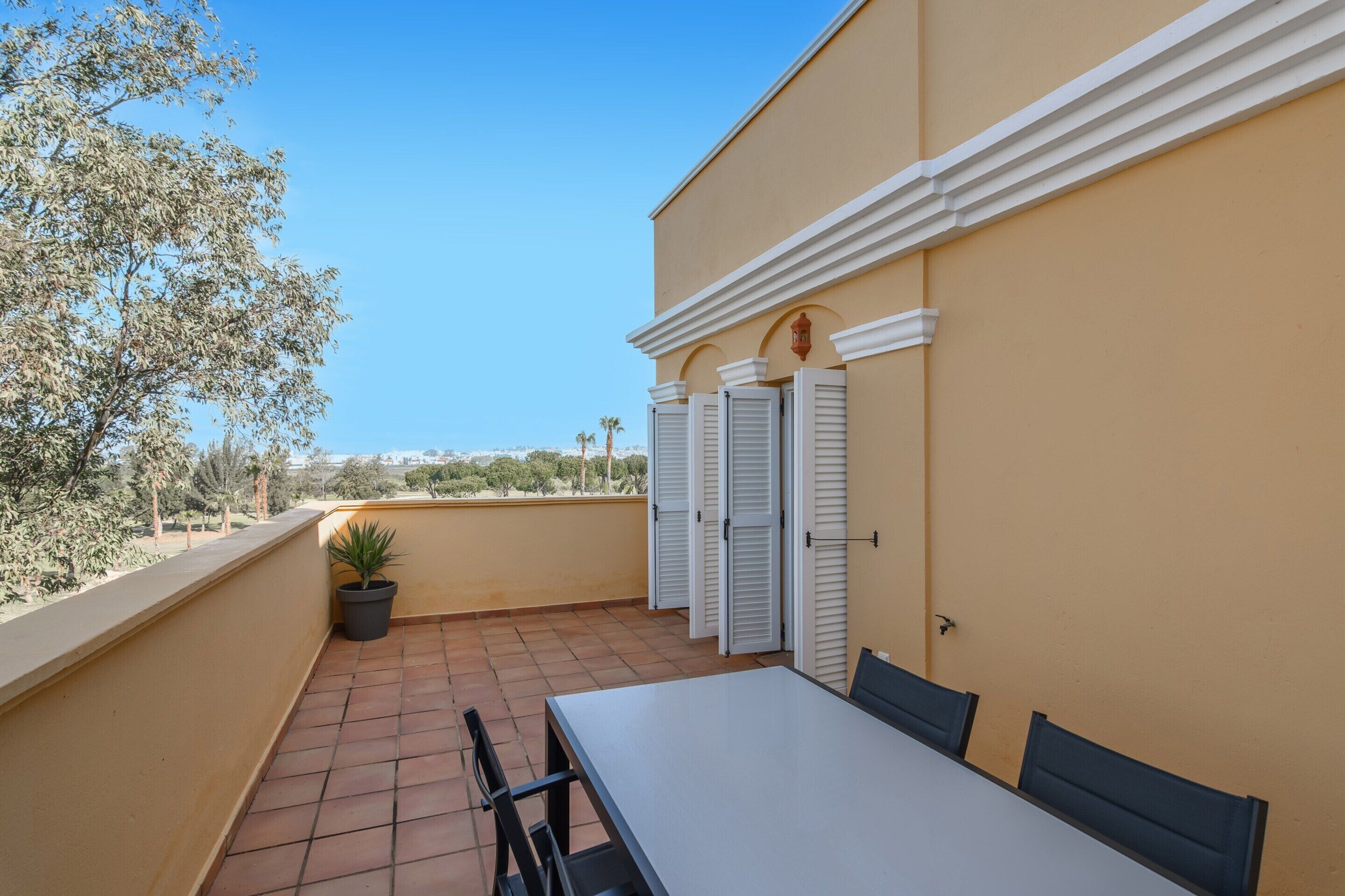 Apartamento | Restaurante al aire libre