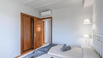 Apartamento | 2 dormitorios y tabla de planchar con plancha