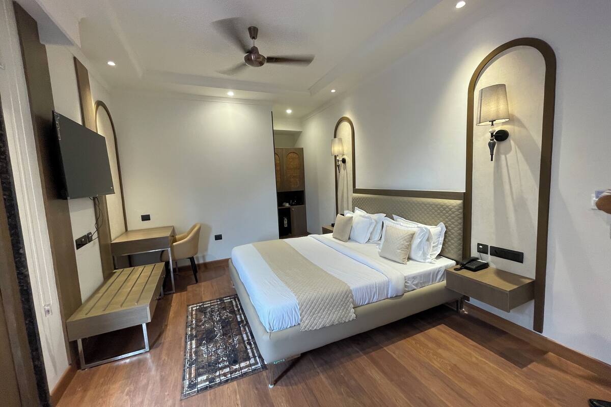 Family Suite, Balcony, City View | Minibar, in-room safe, soundproofing, iron/ironing board