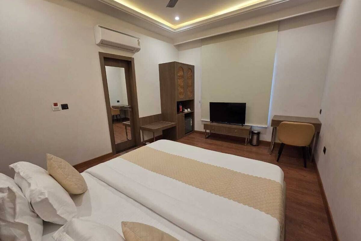 Superior Double Room, City View | Minibar, in-room safe, soundproofing, iron/ironing board