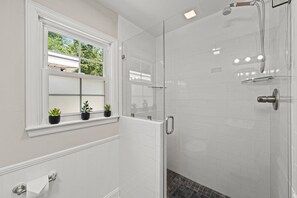 Shower, towels, soap, toilet paper
