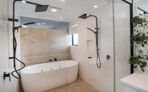 Shower, hair dryer, towels, soap