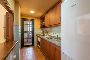 Apartment | Private kitchen - Golfside Comfort With Terrace & Pool (Ayamonte)