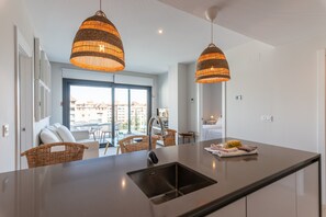 Apartment | Private kitchen - Beachfront Views and Poolside Stay (Ayamonte)