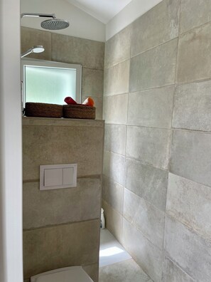 Shower, hair dryer, towels, toilet paper