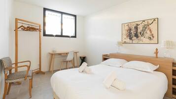 1 bedroom, laptop workspace, iron/ironing board