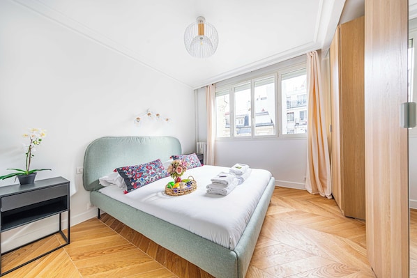 1 bedroom, laptop workspace, iron/ironing board, bed sheets