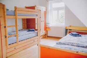 4 bedrooms, desk, iron/ironing board, travel cot