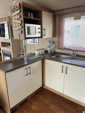 Microondas, horno y parrilla de estufa