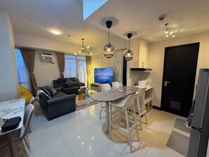 Condo, 2 Bedrooms, Accessible, Balcony | Living room - Modern & Spacious 2BR 68 sqm Condo in Manhattan Heights Pool View (Quezon City)