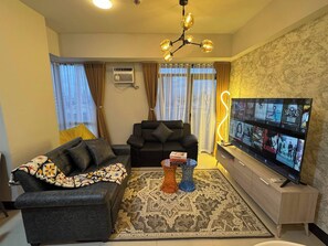 Condo, 2 Bedrooms, Accessible, Balcony | Living room - Modern & Spacious 2BR 68 sqm Condo in Manhattan Heights Pool View (Quezon City)