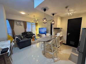 Condo, 2 Bedrooms, Accessible, Balcony | Living room - Modern & Spacious 2BR 68 sqm Condo in Manhattan Heights Pool View (Quezon City)