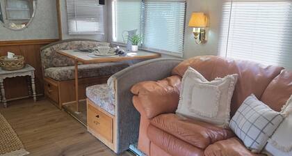 Garden vibe stationary RV in No.
San Diego County with WiFi, AC. TV. Views.