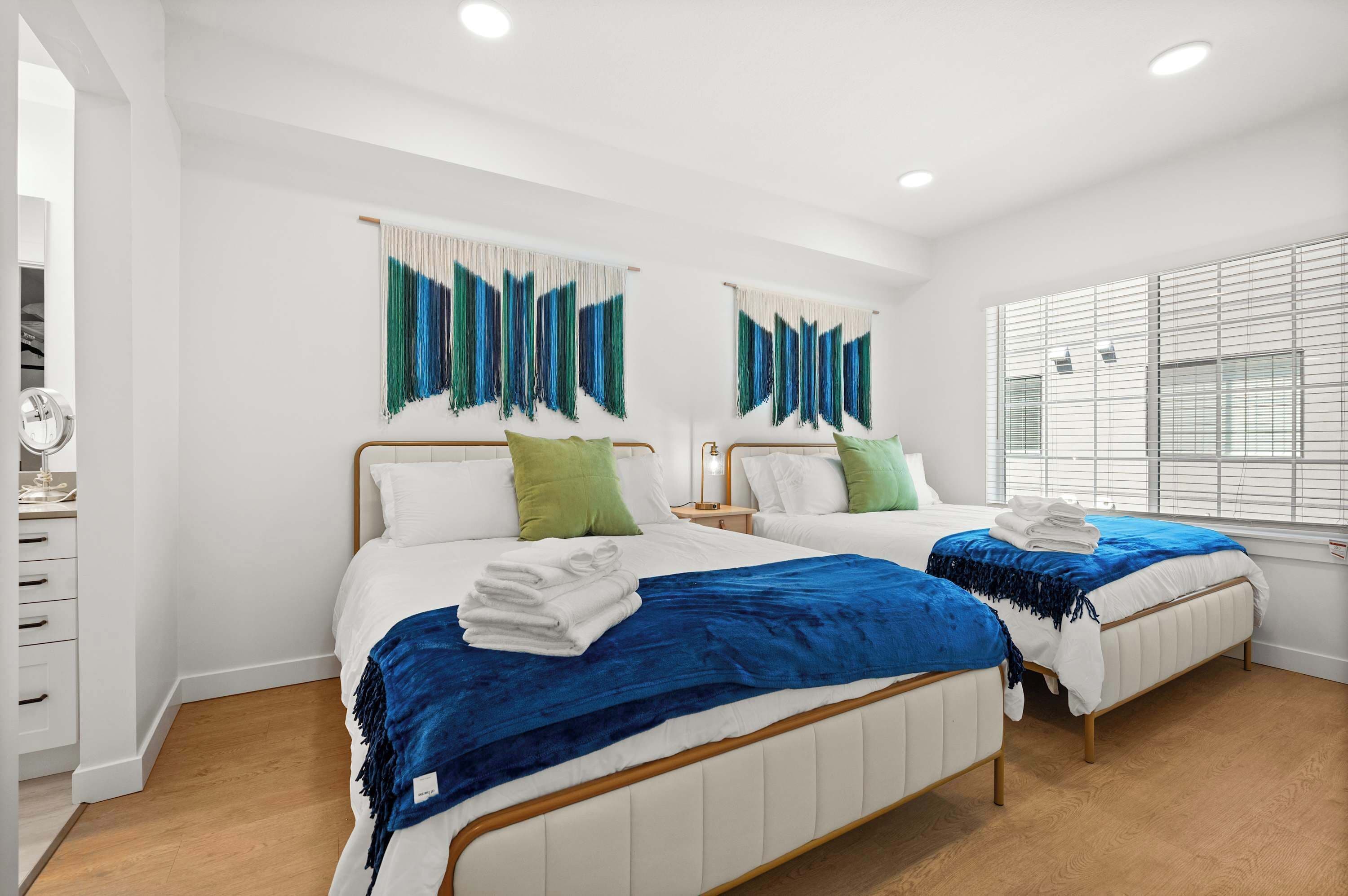 2 bedrooms, desk, iron/ironing board, travel crib